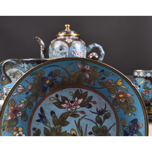 111 - A Chinese cloisonne tea service, 19th century Worked with shaped panels of auspicious flowers and fo... 