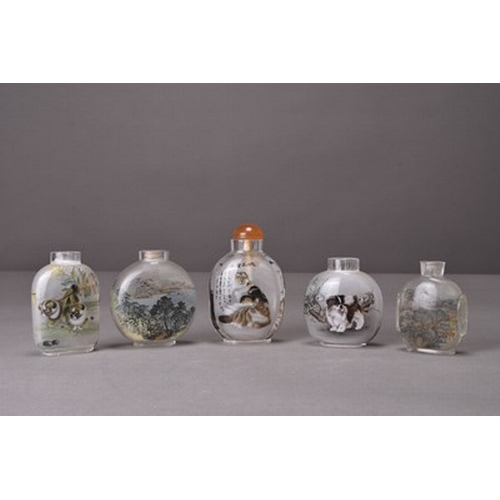 166 - A group of five Chinese internally painted glass snuff bottles 20th century Three decorated with cat... 