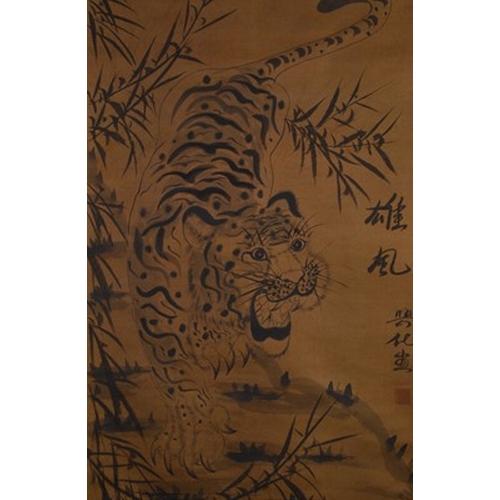 175 - Chinese school, 19th/20th century Stalking tiger, ink and wash on hand scroll, 95cm x 47cm; two tige... 