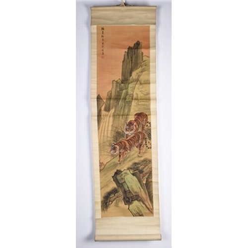 175 - Chinese school, 19th/20th century Stalking tiger, ink and wash on hand scroll, 95cm x 47cm; two tige... 