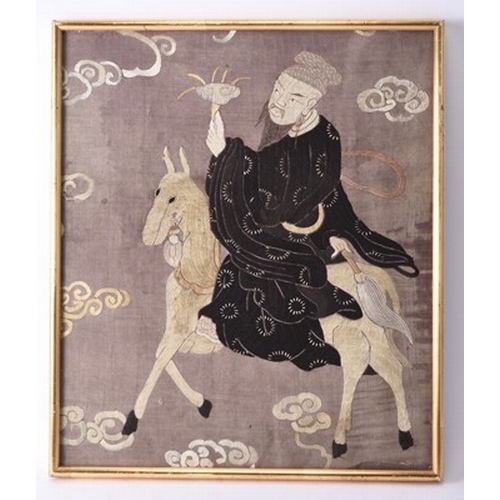 182 - Two Chinese embroidered silk panels of immortals, Qing Dynasty The first of Shoulao riding a deer an... 