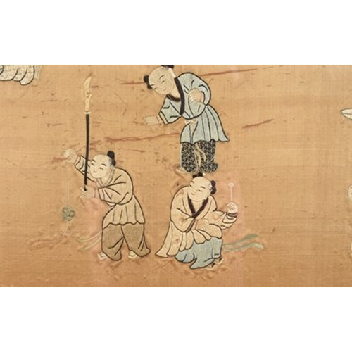 186 - A Chinese embroidered silk panel fragment of playing boys Qing Dynasty Worked in coloured threads on... 