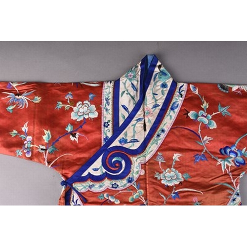 187 - A Chinese silk embroidered child's robe, Qing Dynasty Worked in coloured threads with phoenix birds,... 