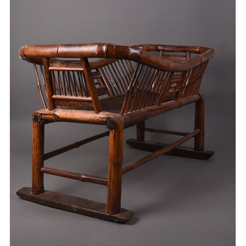 191 - A Chinese bamboo cradle, 19th century 92cm long x 46cm wide x 56cm high