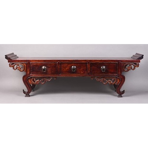 192 - A Chinese lacquered softwood calligraphy table Late Qing Dynasty, the moulded top above three frieze... 