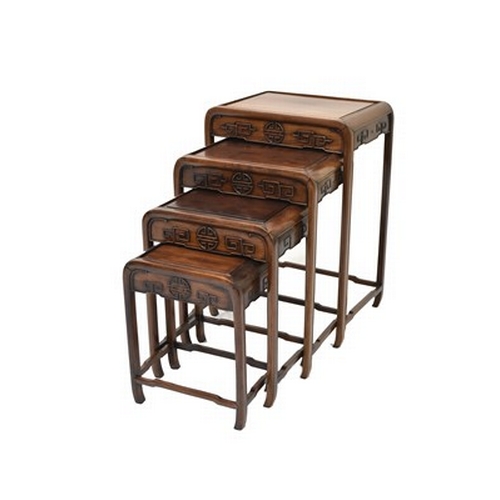 193 - A nest of four Chinese rosewood tables, 20th century The moulded tops above shaped friezes carved wi... 