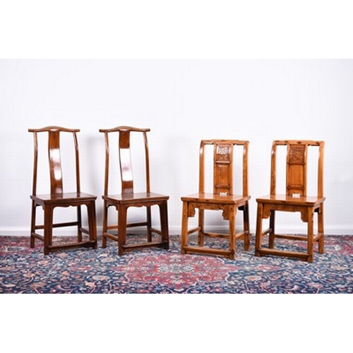 196 - A Chinese mixed wood extending table, 20th century The panelled top above a panelled frieze with two... 