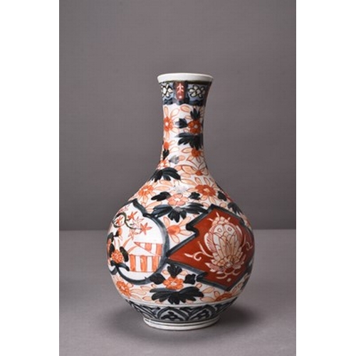 197 - A Japanese Imari bottle vase and an Imari bowl Edo/Meiji era Decorated with stylised flowers and fol... 