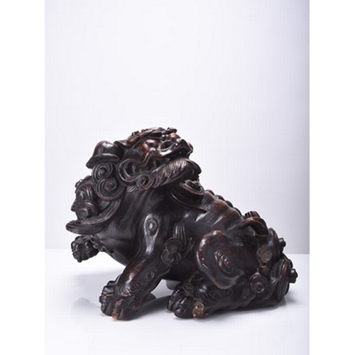 230 - A large Japanese carved wood figure of a komainu, Edo/Meiji era Signed to the underside. 32cm long x... 