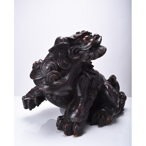 230 - A large Japanese carved wood figure of a komainu, Edo/Meiji era Signed to the underside. 32cm long x... 