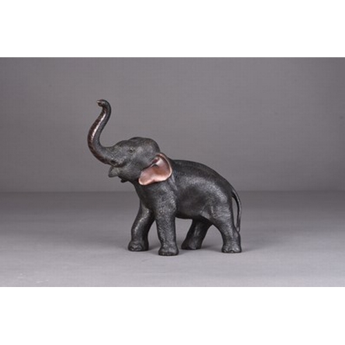 236 - A Japanese bronze figure of an elephant, Meiji era Standing four square with trunk raised in salute.... 