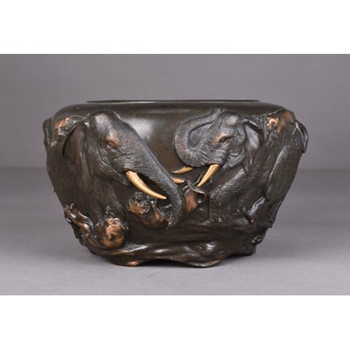 237 - A Japanese bronze planter, Meiji era Of rounded form and cast in relief with a continuous scene of e... 