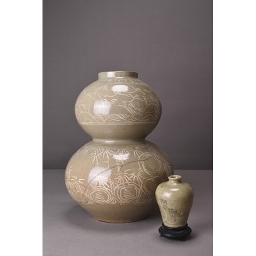 248 - Two Korean celadon pottery vases Probably late Joseon era The first of double-gourd form and decorat... 