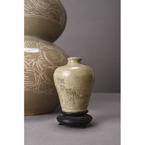 248 - Two Korean celadon pottery vases Probably late Joseon era The first of double-gourd form and decorat... 