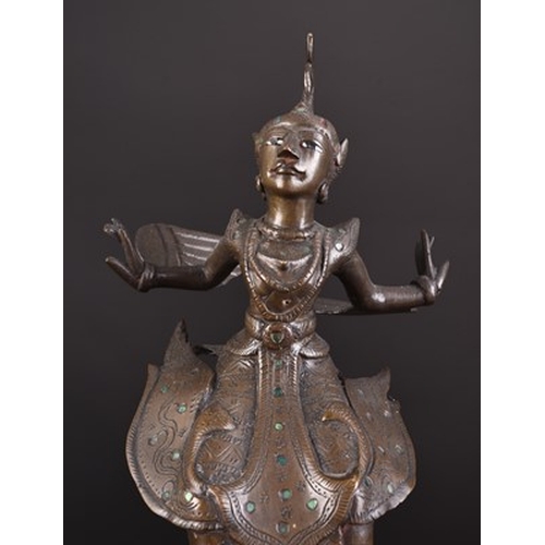 249 - A Burmese bronze figure of a Nat temple dancer Early 20th century 24cm high