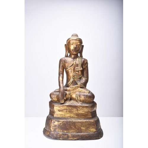 254 - A South East Asian gilt lacquer figure of a bodhisattva Early 20th century, modelled seated on a ped... 