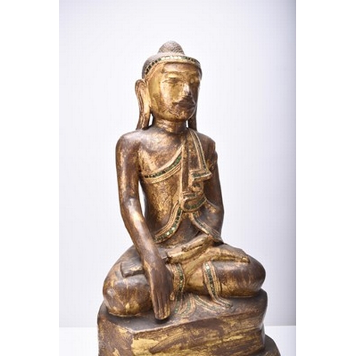 254 - A South East Asian gilt lacquer figure of a bodhisattva Early 20th century, modelled seated on a ped... 