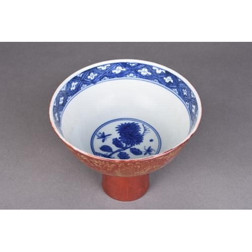 27 - A Chinese iron red and gilt blue and white stem cup Jiajing six-character mark but probably later De... 