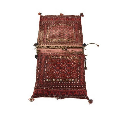 279 - An Oushak runner, 290cm x 84cm, a Caucasian runner, 290cm x 84cm, three various donkey bags and a Bo... 