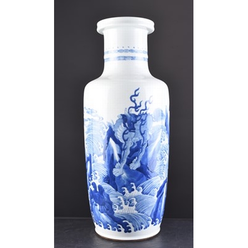 28 - A Chinese blue and white rouleau vase, 19th century Decorated with a scene of Qilin and Pixiu perche... 