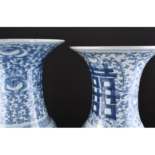 34 - A near pair of Chinese blue and white Nyonya yenyen vases Decorated with Shou symbols amid dense fol... 