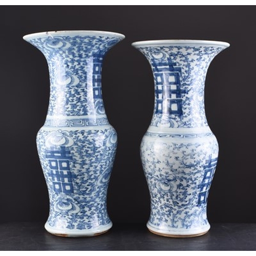 34 - A near pair of Chinese blue and white Nyonya yenyen vases Decorated with Shou symbols amid dense fol... 