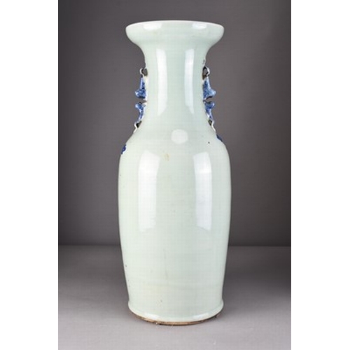 36 - A large Chinese blue and white celadon vase, 19th century Of ovoid form with twin lion-dog handles, ... 