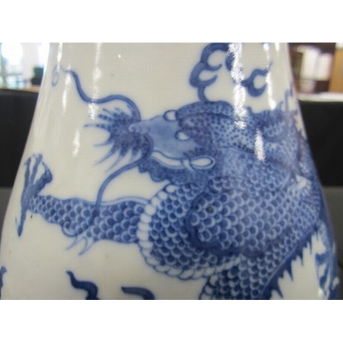 43 - A Chinese blue and white dragon vase Kangxi six-character mark but 19th century Of ovoid form with d... 