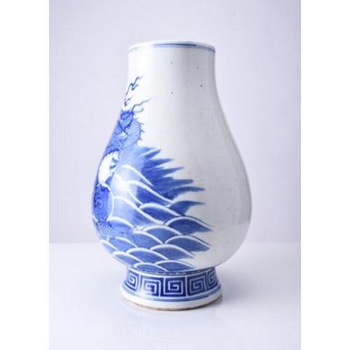 43 - A Chinese blue and white dragon vase Kangxi six-character mark but 19th century Of ovoid form with d... 