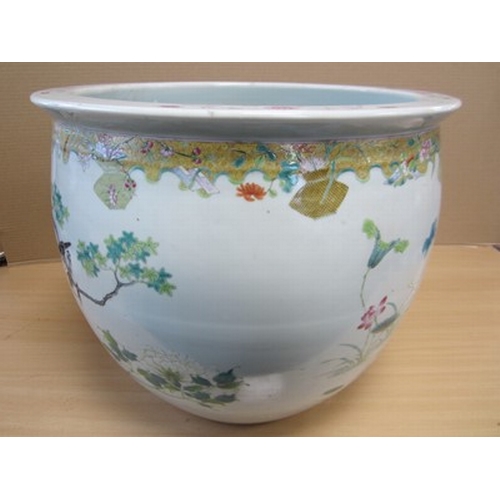 53 - A good Chinese famille rose fish bowl, 18th century Of ovoid form with everted rim, finely painted i... 