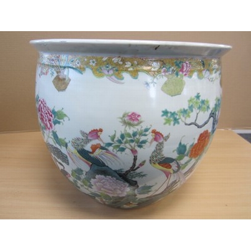 53 - A good Chinese famille rose fish bowl, 18th century Of ovoid form with everted rim, finely painted i... 