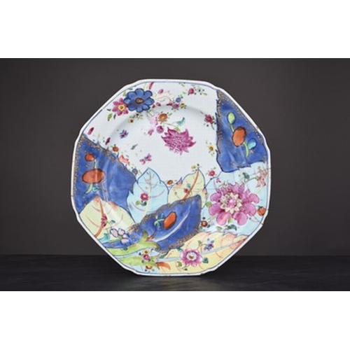 55 - A Chinese 'Tobacco Leaf' pattern plate, 18th century Of octagonal form, 23cm dia. (repaired), togeth... 