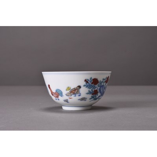 60 - A Chinese Doucai porcelain chicken cup Chenghua six-character mark but later Of conical form and dec... 