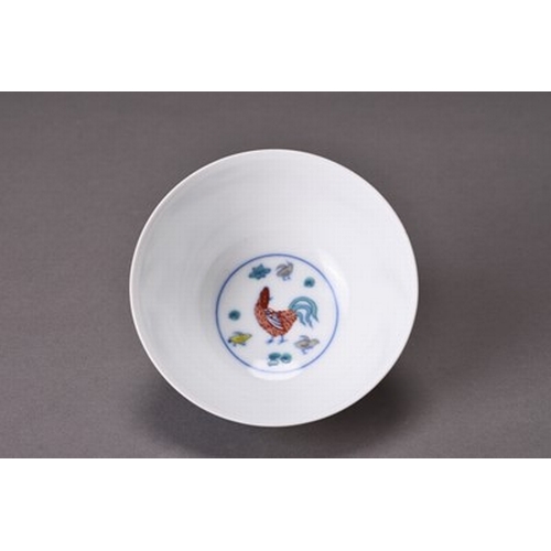 60 - A Chinese Doucai porcelain chicken cup Chenghua six-character mark but later Of conical form and dec... 