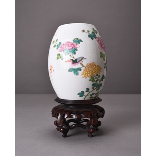 61 - A Chinese famille rose ovoid vase, possibly Yongzheng Of ovoid form and finely painted in fencai ena... 