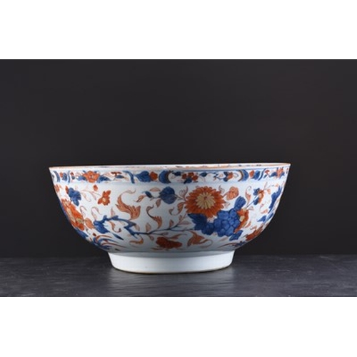 65 - A Chinese Imari punch bowl, 18th century Of rounded form and decorated with peonies and chrysanthemu... 