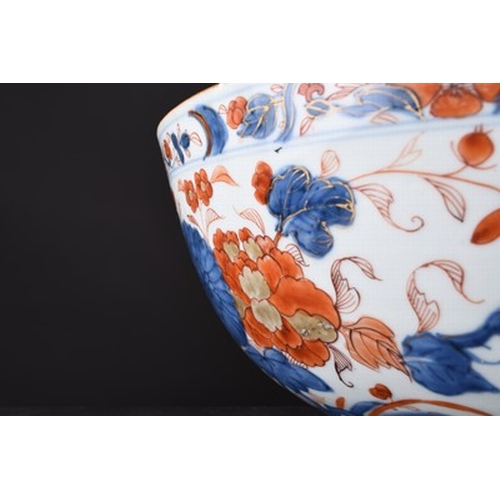 65 - A Chinese Imari punch bowl, 18th century Of rounded form and decorated with peonies and chrysanthemu... 