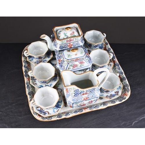 66 - A Chinese Doucai style miniature cabaret tea service, Qing Dynasty Of canted form and decorated in c... 