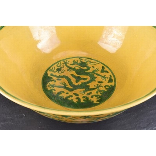 69 - A Chinese yellow ground dragon bowl, Jiajing six-character mark but later Probably 19th century, of ... 