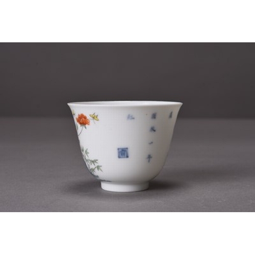 70 - A Chinese Wucai 'month' cup Kangxi six-character mark and possibly of the period Finely potted with ... 