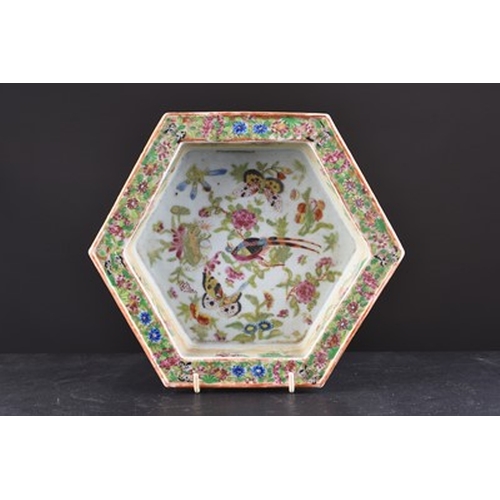 78 - A Chinese Canton famille rose planter and stand, Qing Dynasty Of hexagonal section, decorated with s... 