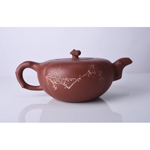 88 - Three Chinese Yixing teapots and covers, 20th century All of compressed ovoid form, the first modell... 