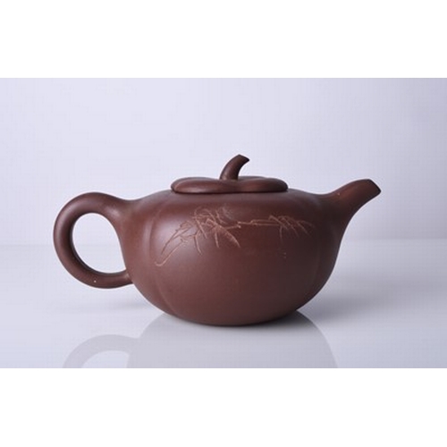 88 - Three Chinese Yixing teapots and covers, 20th century All of compressed ovoid form, the first modell... 