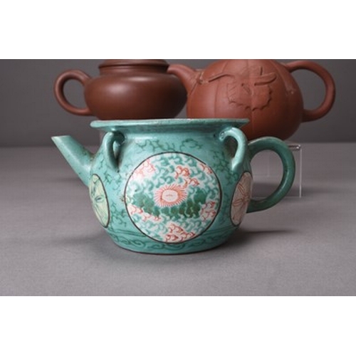 92 - Five Chinese Zisha / Yixing pottery teapots, 20th century Including: A reddish brown pot of compress... 