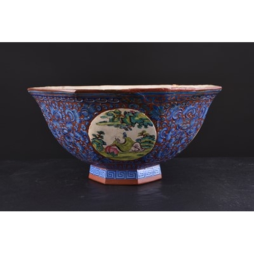 93 - A Chinese enamelled Yixing pottery octagonal bowl, late Qing Dynasty Decorated with circular panels ... 