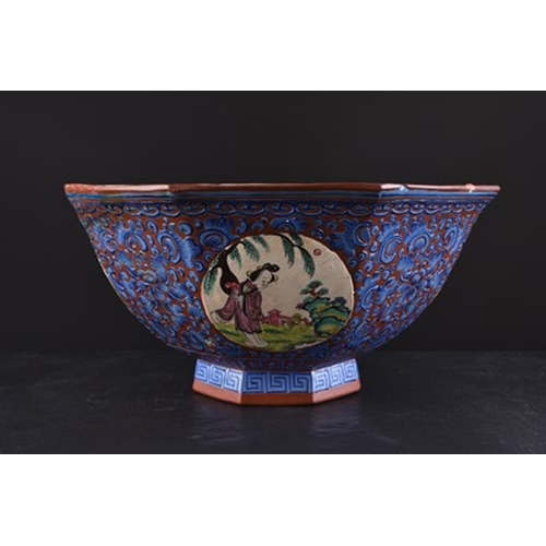 93 - A Chinese enamelled Yixing pottery octagonal bowl, late Qing Dynasty Decorated with circular panels ... 