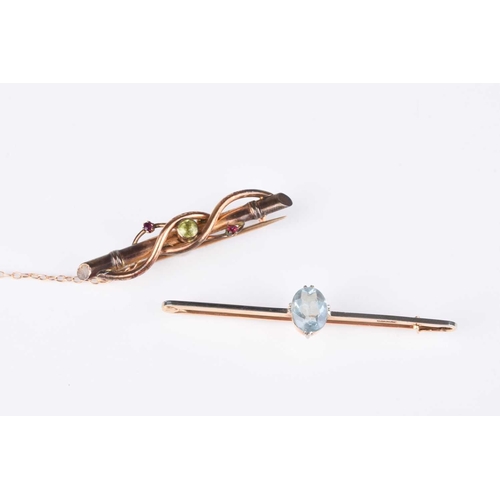 100 - A single stone aquamarine bar brooch, stamped '9c18w', together with an early 20th century peridot a... 