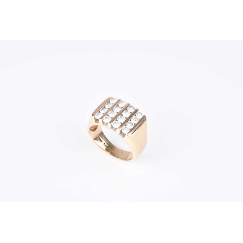 113 - A Gentlemans diamond set panel ring, designed as four rows of four brilliant cut diamonds channel s... 