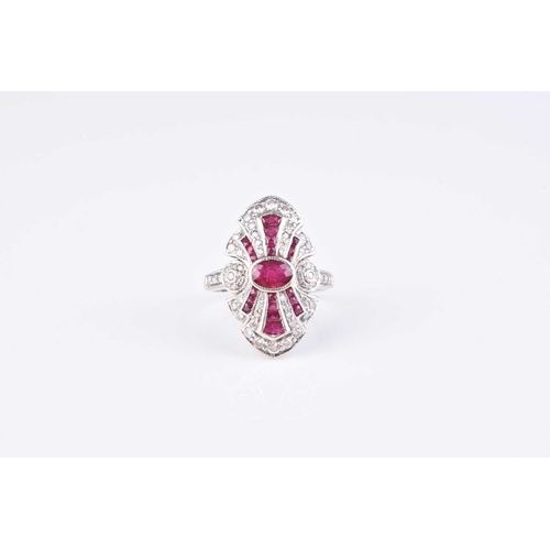 133 - An Art Deco style ruby and diamond cluster ring, designed as a central oval mixed cut ruby collet se... 