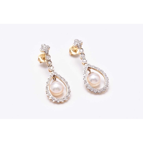 135 - A pair of Edwardian style 18ct gold cultured pearl and diamond ear pendants, each designed as a sing... 